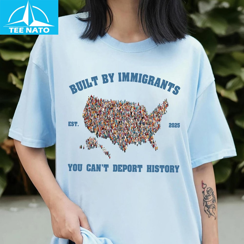 Man wearing Built By Immigrants Shirt